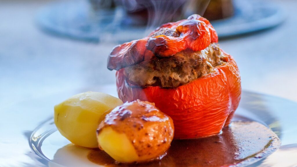 steaming stuffed pepper on a plate