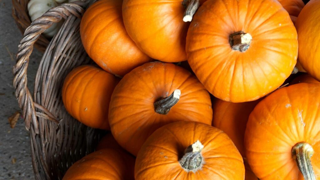 pumpkins in a wicker basket 1920 x 1080