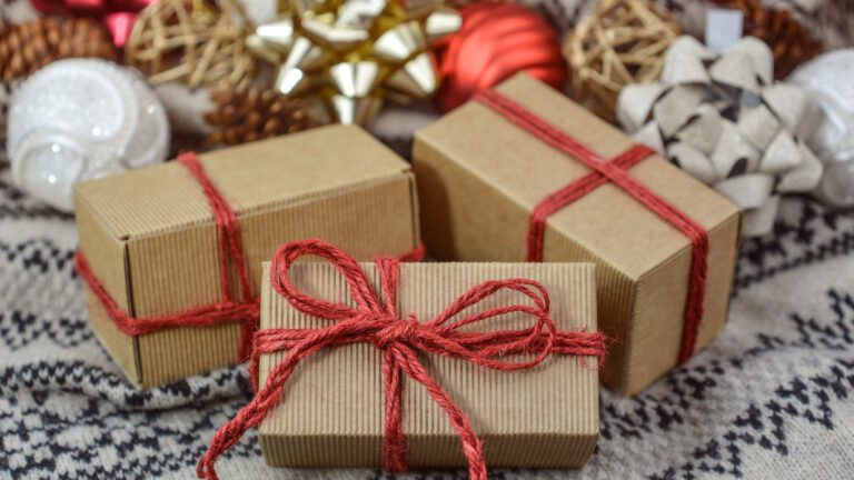 brown paper and decorative string wrapped christmas gifts